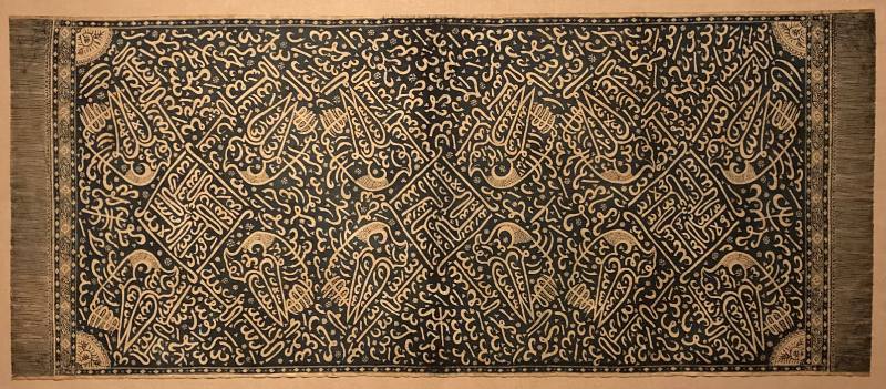 Ceremonial batik Arab cloth with birds and Arabic symbols in ivory on blue